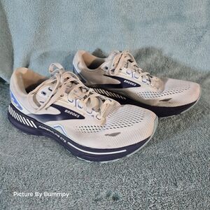 Brooks Adrenaline GTS 23 running shoes in a white and blue colorway.
